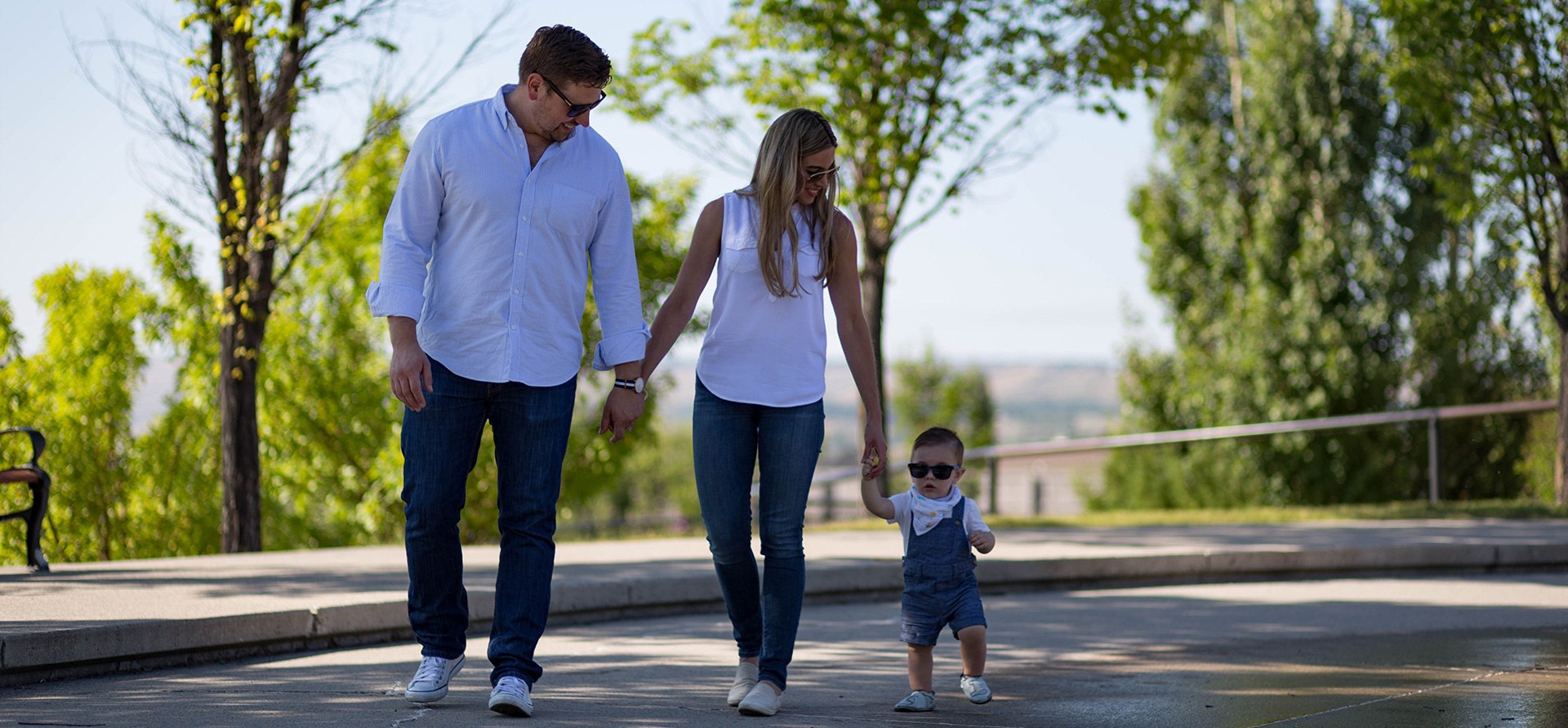 Couple on a walk with their baby